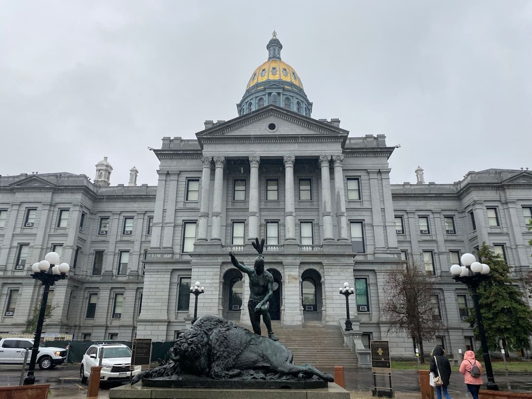 massachusetts support animal — a large building with a statue in front of it