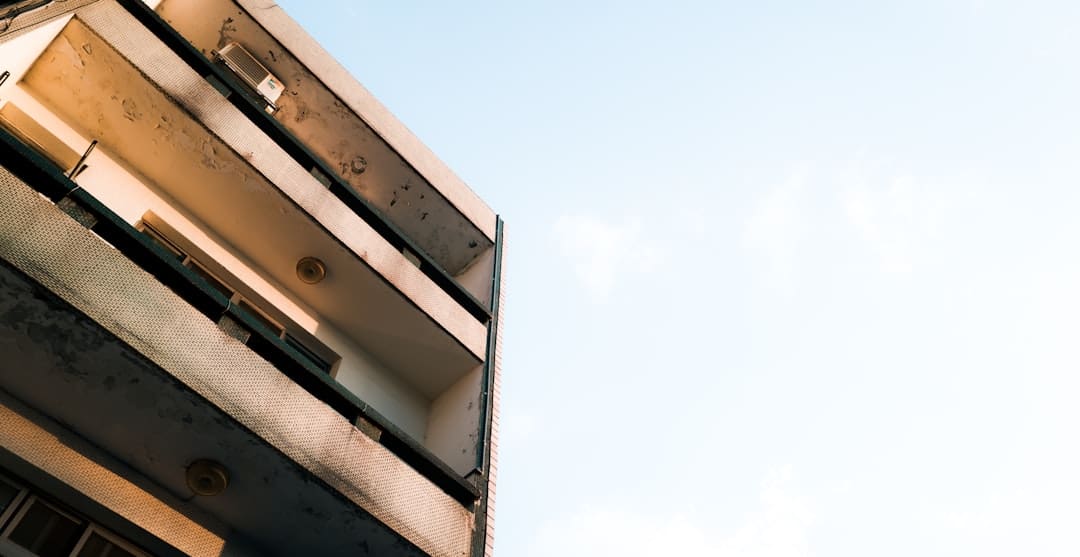 washington support animal — Modern apartment building balconies against a clear sky