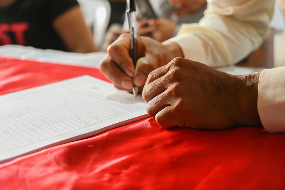 Wisconsin support animal — a person writing on a piece of paper